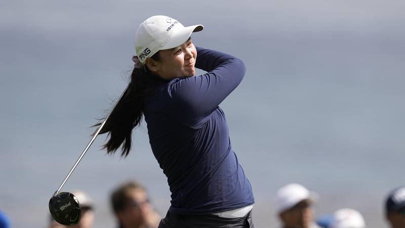 Allisen Corpuz hits from the 14th tee during the final round of the U.S. Women's Open golf...