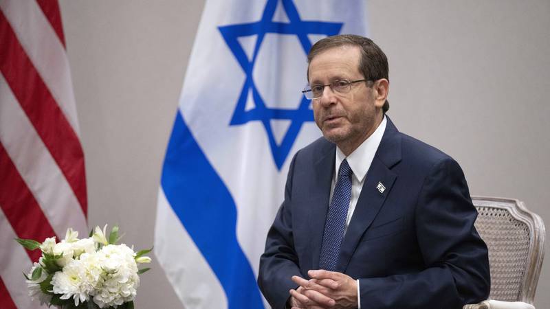 Israel's President Isaac Herzog speaks during a meeting with Secretary of State Antony Blinken...