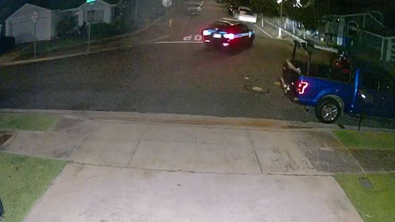 Honolulu Police SUV driving past scene of hit-and-run