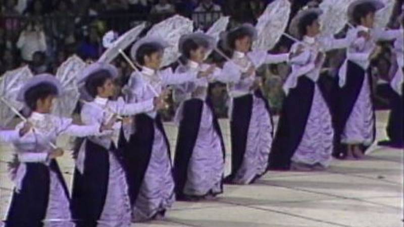 Hula dancers in elaborate ensembles take the stage in 'Auana Night at Merrie Monarch 1983.