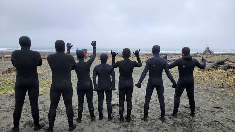 Hokulea crew members wore wet suits to surf in Alaska.