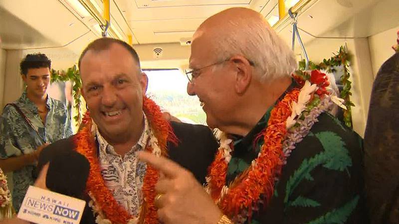 Gov. Josh Green and Honolulu Mayor Rick Blangiardi enjoy the inaugural rail ride.