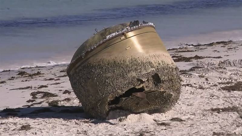 In this image made from video, a cylindrical object is seen on beach in Green Head, Australia,...