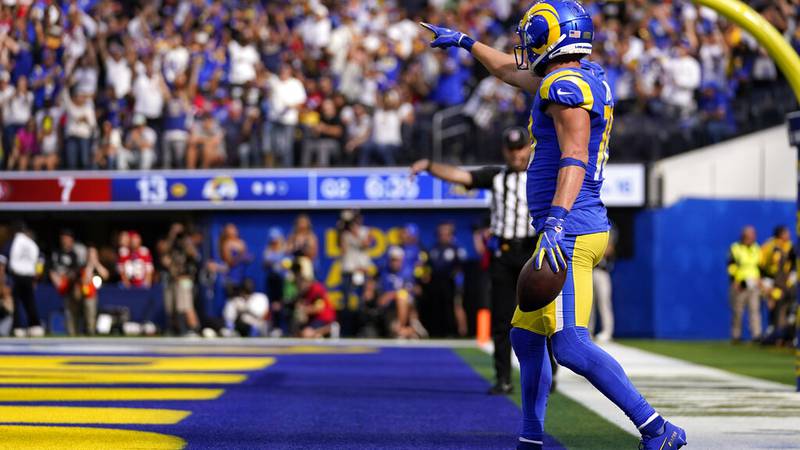Los Angeles Rams wide receiver Cooper Kupp, right, celebrates after making a touchdown catch...